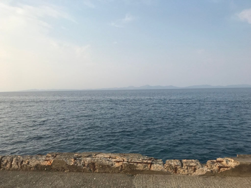 View of the ocean from the edge of the old pier.