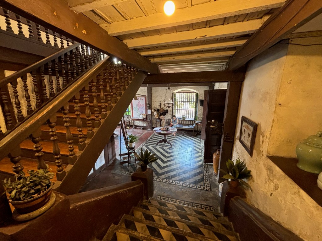 An elegant wooden staircase to the second floor.